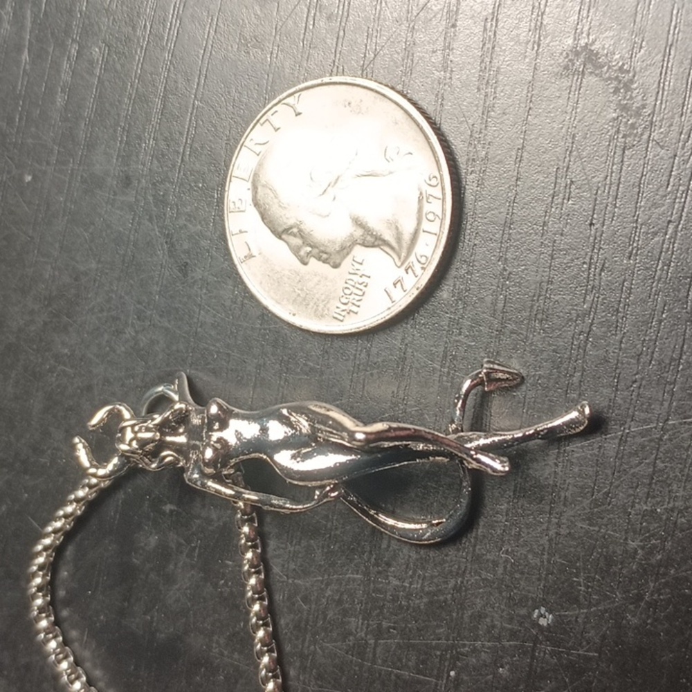 Devil girl pendant necklace.